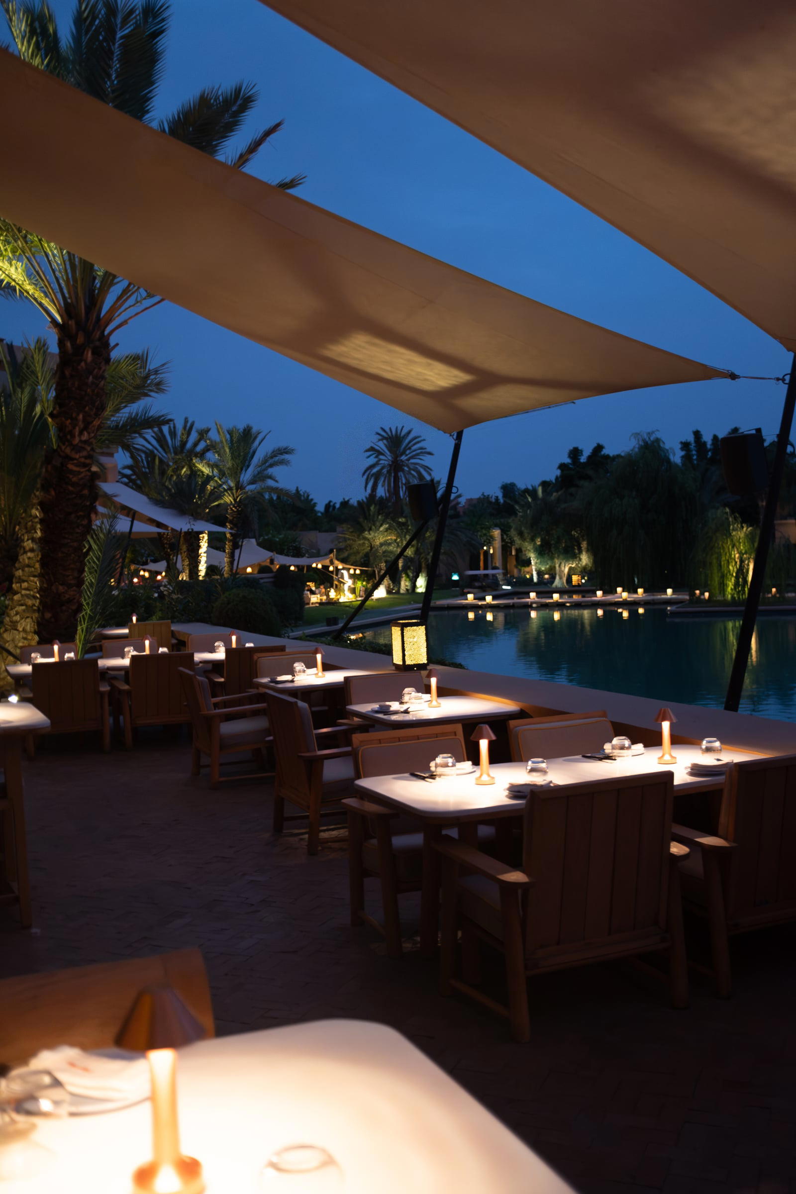 Tables on the Ling Ling terrace after dark