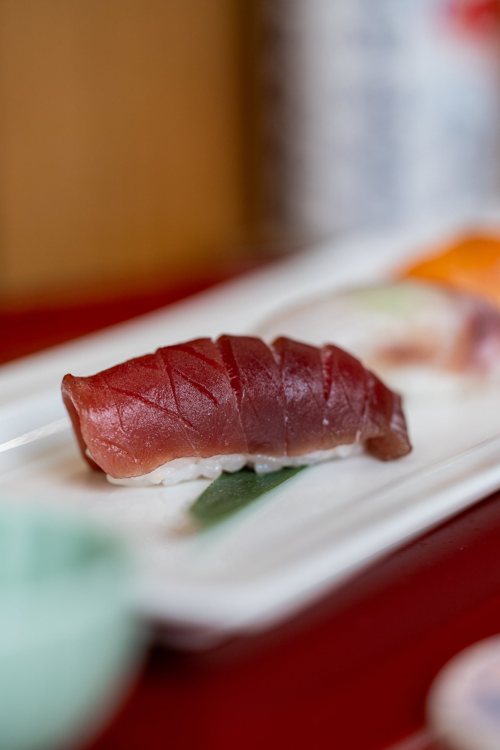 A piece of tuna nigiri at IKI. Credit Joanne Poinsignon