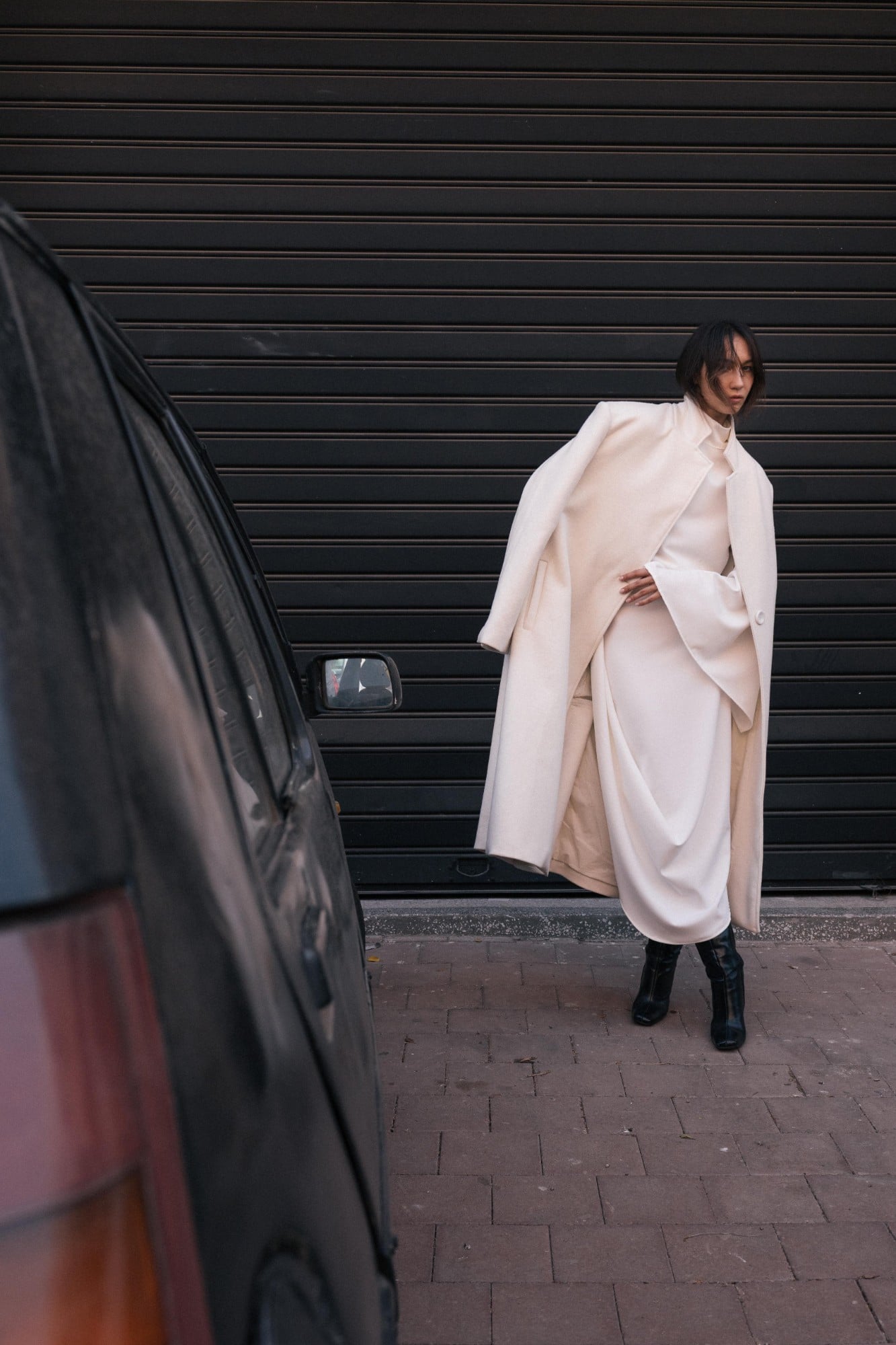 A look by House of Sensi, white coat. Courtesy House of Sensi