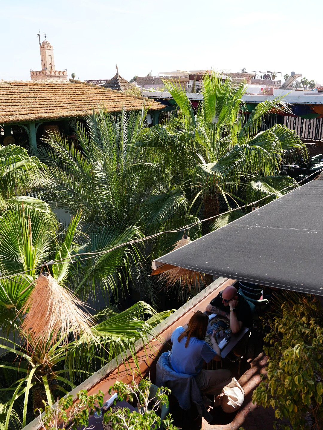 View from La Pergola over palms and medina roofs to the Koutoubia minaret