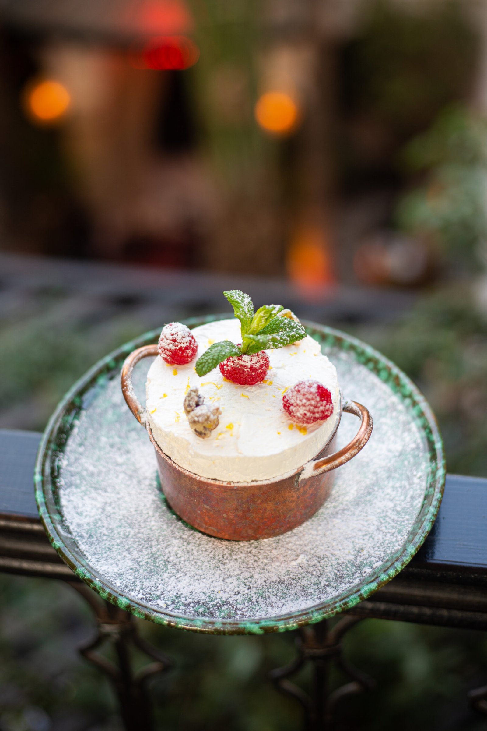 A dessert in a small copper pot on the La Pergola rooftop