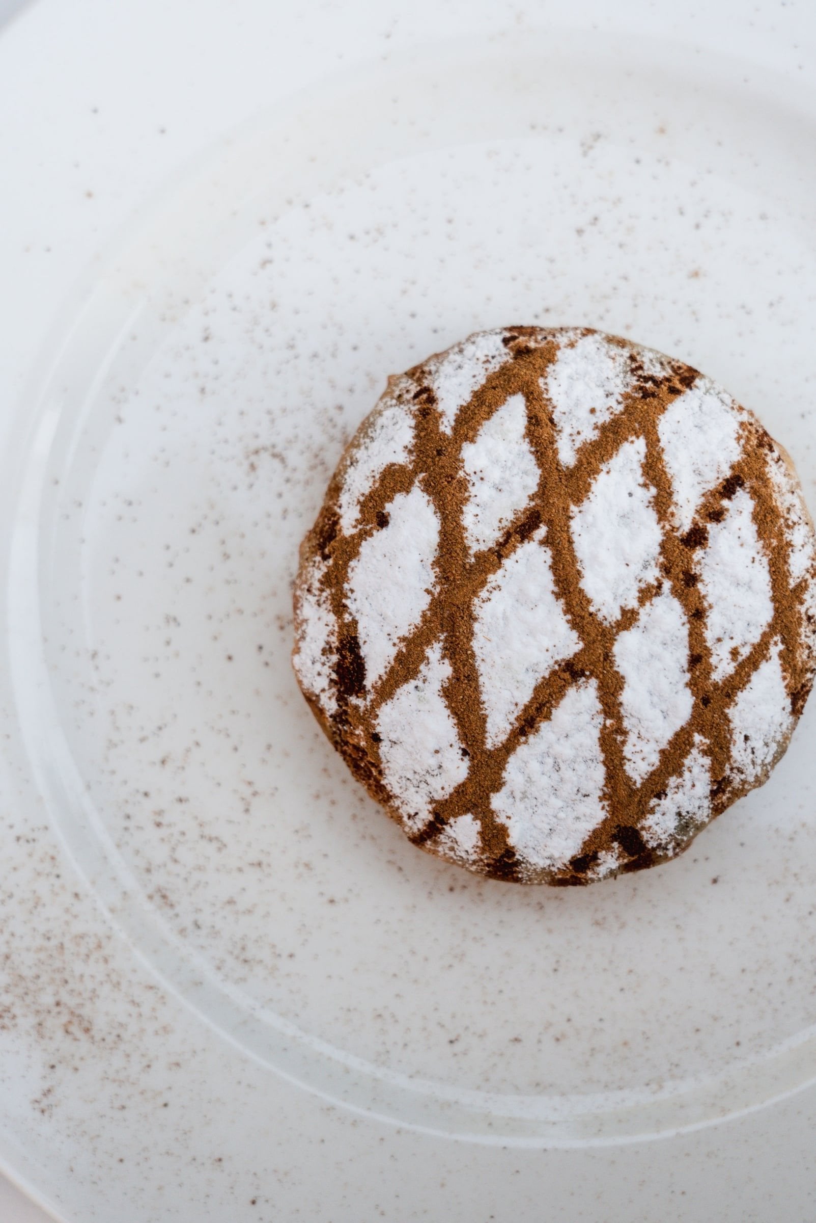 A pastilla dusted with icing sugar and cinnamon on a white plate at Salammbô, Les Deux Tours